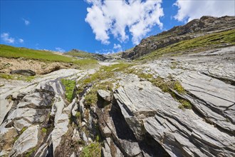 View from Gamsgrubenweg up the mountains into the sky on a sunny day at Hochalpenstrasse, Pinzgau,