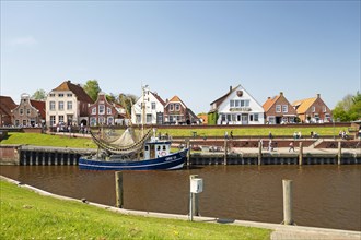 Picturesque cutter harbour, Greetsiel, gabled houses, Krummhoern, East Frisia, Germany, Europe
