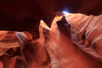 View up into a canyon with impressive rock formations during the blue hour, Upper Antelope Canyon,