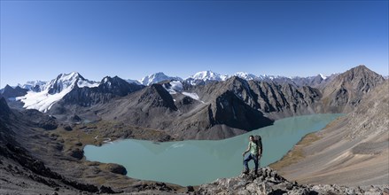 Panorama, mountaineers on the way to the Ala Kul Pass, view of mountains and glaciers and turquoise