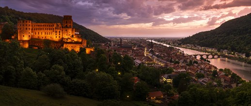 The city of Heidelberg at sunset after a thunderstorm with a special lighting mood. The historic