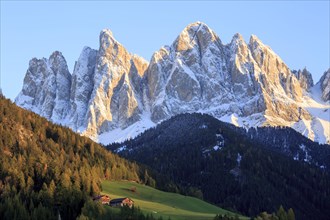 Rocky mountain peaks in the warm light of the setting sun, Italy, Trentino-Alto Adige, Alto Adige,