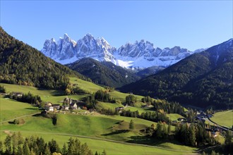 Idyllic Alpine landscape with snow-capped peaks, forests and meadows, Italy, Trentino-Alto Adige,