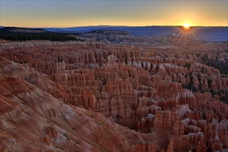 Spectacular sunset behind the silhouetted rock formations, Bryce Canyon National Park, North