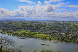 View from Drachenfels, mountain in the Siebengebirge on the Rhine with cargo ships between