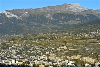 The town of Sion with the church of Notre-Dame de Valere, Basilica of Valeria on the Valeria hill