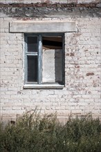 Abandoned building, window, ghost town Enilchek in the Tien Shan Mountains, Ak-Su, Kyrgyzstan, Asia