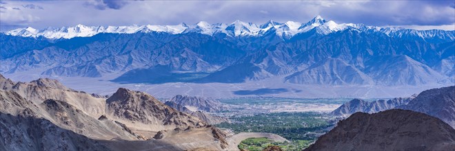 Panorama from the Khardong Pass, the second highest motorway pass in the world, over Leh and the