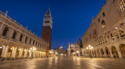 Illuminated Doge's Palace and St Mark's Basilica in Piazetta San Marco, Campanile bell tower, blue