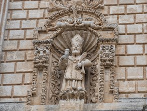 Figure of a saint, relief on the facade of San Nicola Cathedral, Cattedrale Turritana Sassari,