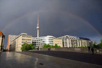 Rainbow over the Berlin television tower, taken from the Friedrichsbruecke bridge over the Spree,