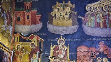 Colourful frescoes depict biblical scenes with saints, angels and architectural motifs, Panagia