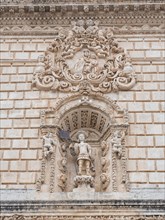 Figure of a saint, relief on the facade of San Nicola Cathedral, Cattedrale Turritana Sassari,