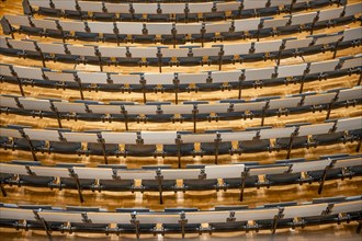 View from above of empty rows of seats in a lecture theatre, interior photo, Department of