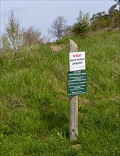 Signpost on the cliffs of Alt-Reddevitz, Ruegen, Mecklenburg-Western Pomerania, Germany, Europe