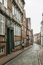 Half-timbered houses and alley in the old town, Buxtehude, Altes Land, Lower Saxony, Germany,