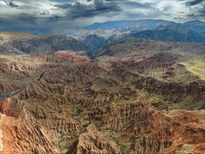 Badlands, gorges and mountains, eroded red sandstone cliffs, Konorchek Canyon, Boom Gorge, aerial