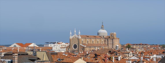 View over the roofs of Venice to the church Basilica dei Santi Giovanni e Paolo, view from the roof