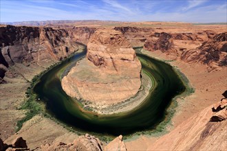 The impressive natural phenomenon of Horseshoe Bend under a clear blue sky, Horseshoe Bend, North