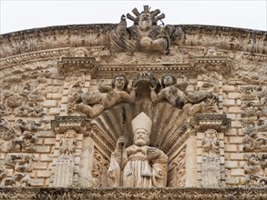 Relief of St Nicholas of Bari on the facade of San Nicola Cathedral, Cattedrale Turritana Sassari,