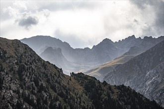 Dramatic mountains and rocks, mountain valley, Chong Kyzyl Suu Valley, Terskey Ala Too, Tien-Shan
