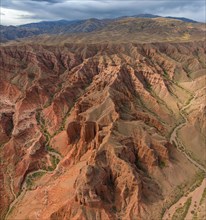 Gorge with eroded red sandstone rocks, Konorchek Canyon, Boom Gorge, aerial view, Kyrgyzstan, Asia