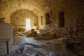 Knights' building, ground floor, interior of an old ruin with stone blocks and a vaulted ceiling,