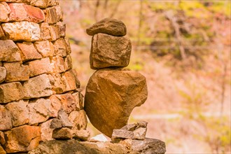 Pyramid of three stones balanced on top of one another used to make wish for better future in South