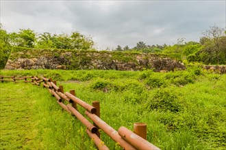Remains of Japanese stone fortress set off by wooden fence in Suncheon, South Korea, Asia