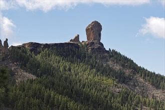 Mighty basalt rock Roque Nublo, also known as Cloud Rock, landmark and highest point of the island