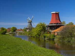 The twin mills at the old Greetsieler Sieltief, Greetsiel, Krummhoern, East Frisia, Lower Saxony,