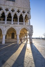 Doge's Palace with Sun Star in the Piazetta San Marco, St Mark's Square, Venice, Veneto, Italy,