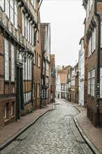 Half-timbered houses and alley in the old town, Buxtehude, Altes Land, Lower Saxony, Germany,