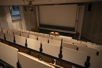 Rows of seats in a small empty lecture theatre, interior photo, Department of Mechanical