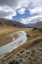 Mountain valley with Sary Jaz river, autumn mountains with yellow grass, Tien Shan, Kyrgyzstan,