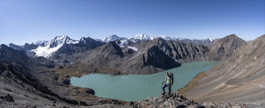 Panorama, mountaineers on the way to the Ala Kul Pass, view of mountains and glaciers and turquoise