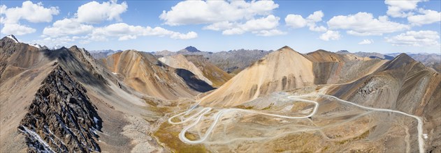 Aerial view, road with serpentines, mountain pass in the Tien Shan, Chong Ashuu Pass, Kyrgyzstan,