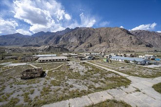 View of the village with abandoned and still inhabited houses, ghost town, Engilchek, Tian Shan,