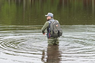 Black bass fisherman in close up, Cambara do sul, Rio Grande do sul, Brazil, South America