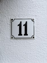 House number plate, number 11, digit, anniversary, birthday, North Rhine-Westphalia, Germany,