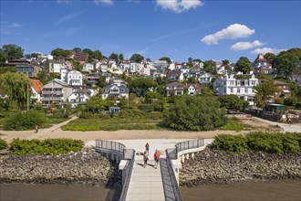 Elbe riverbank with jetty, villas and residential buildings, Blankenese district, Hamburg, Germany,
