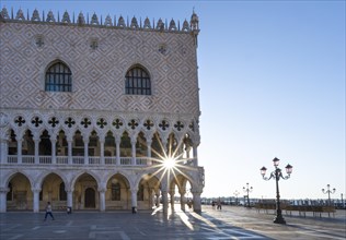 Doge's Palace with Sun Star in the Piazetta San Marco, St Mark's Square, Venice, Veneto, Italy,
