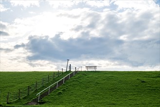 Lonely viewing bench on the dyke to the Dollart near Pogum, municipality of Jemgum, district of