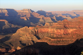The elevations of the Grand Canyon stand out sharply against the twilight sky, Grand Canyon