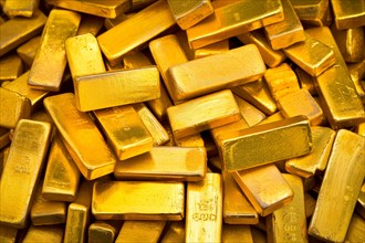 Banking finance concept background, pile of gold bars bullions ingots close up, AI generated