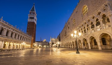 Illuminated Doge's Palace and St Mark's Basilica in Piazetta San Marco, Campanile bell tower, blue