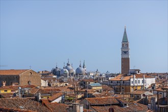 View over the roofs of Venice to the Campanile bell tower and the domes of St Mark's Basilica, view