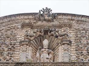 Relief of St Nicholas of Bari on the facade of San Nicola Cathedral, Cattedrale Turritana Sassari,