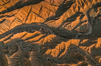 Aerial view, View from above, Canyon runs through landscape, Dramatic barren landscape of eroded