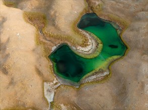Barren landscape with turquoise lakes, aerial view, top-down view, Chong-Alay District, Kyrgyzstan,